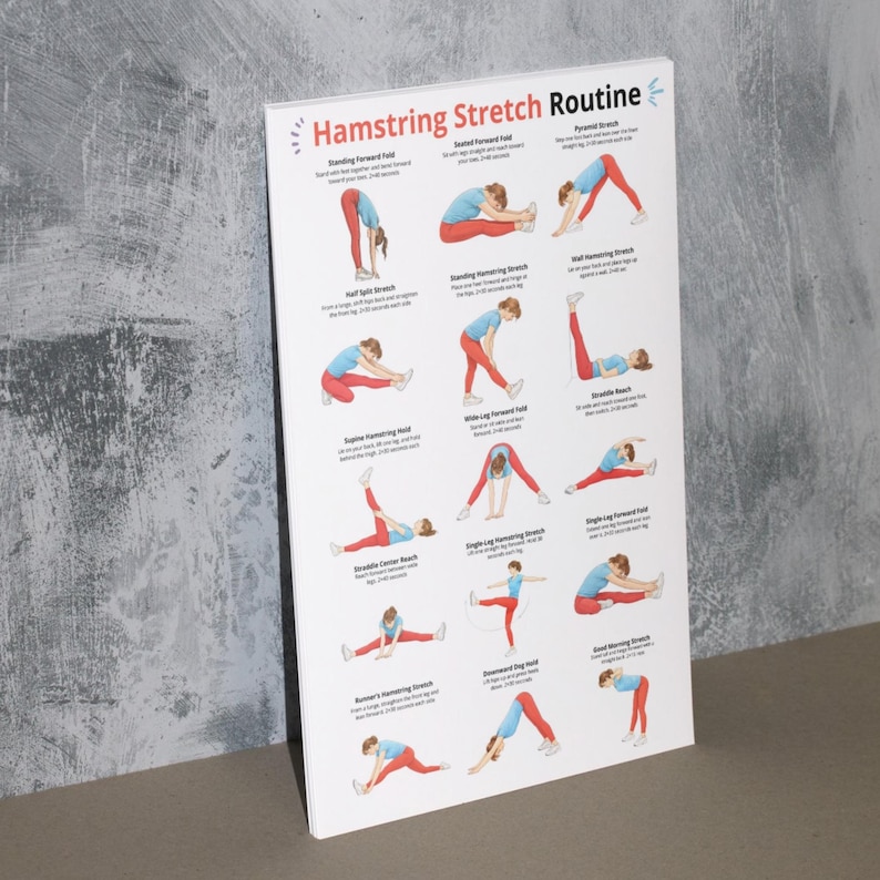 May include: A white poster titled "Hamstring Stretch Routine" with illustrations of various stretches. The illustrations depict people in blue tops and red bottoms demonstrating each stretch. The poster is leaning against a gray wall.