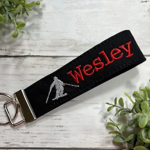 Skier Personalized wristlet Keychain / Winter keychain/ gifts under 15/ Gift for her/ new driver keychain/ Ski team gift image 1