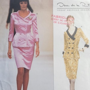 May include: Vogue Patterns sewing pattern featuring two suit designs by Oscar de la Renta. One is a pink satin double-breasted jacket and pencil skirt. The other is a gold patterned jacket and skirt.