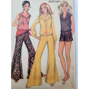 May include: A vintage sewing pattern illustration featuring three outfits: a sleeveless red patterned top with matching wide-leg trousers and a red sash, a solid yellow long-sleeve shirt with flared trousers, and a sleeveless dark brown patterned romper.