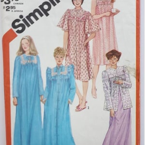 May include: Simplicity sewing pattern for petite sizes 10-12. The pattern features illustrations of various vintage nightgowns and robes in shades of blue, pink, and lavender. The pattern includes the text "SMALL/PETITE" and "MISS/JEUNE FEMME".
