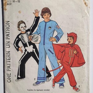 May include: Vintage Simplicity sewing pattern for boys' Halloween costumes. The pattern includes instructions for a skeleton, an astronaut, and a devil costume. The pattern is size large, for sizes 10-12.
