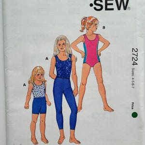 May include: Kwik Sew sewing pattern 2724, featuring illustrations of children's swimwear and activewear. The pattern includes sizes 4-5-6-7. The cover displays a pink and blue swimsuit, a blue leotard and leggings, and a blue and white patterned top with shorts.
