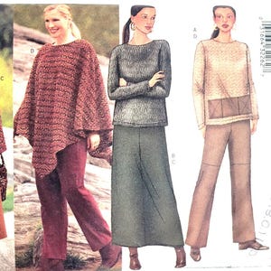 May include: A vintage sewing pattern featuring four different outfit options. The outfits include a poncho, a long skirt, a sweater, and pants. The color palette includes shades of brown, gray, and burgundy. The pattern is from Kathy Ireland.
