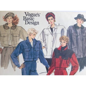 May include: A Vogue's Basic Design sewing pattern envelope featuring illustrations of five different jacket styles. The designs include a tan jacket with a fur collar, a blue cropped jacket, a white jacket, a red and black jacket, and a dark jacket.