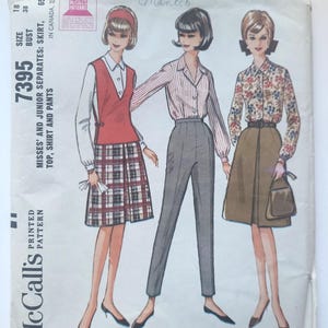 May include: Vintage McCall's sewing pattern 7395 for misses' and junior separates. The pattern includes instructions for a skirt, top, shirt, and pants. The illustration shows three different outfits, including a plaid skirt and a floral print shirt.