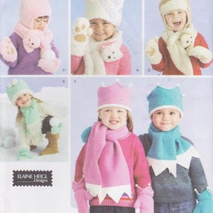 May include: Simplicity pattern 4354 showcasing children's winter accessories. The pattern includes hats, scarves, and mittens in various colours, with some designs incorporating bear-shaped details. The image shows children wearing the finished products.
