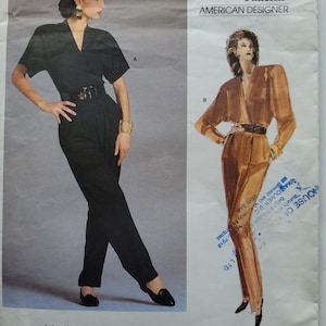 May include: Vogue Patterns American Designer sewing pattern for a jumpsuit. The pattern is by Anne Klein and the pattern number is 1871.