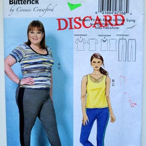 May include: Butterick B6498 sewing pattern envelope by Connie Crawford for sizes XXL-6X. The front features a photograph of a person wearing a blue, yellow, and white striped short-sleeve top with grey trousers, and an illustration of a yellow tank top.