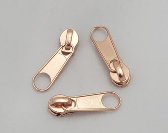 Rose Gold zipper pulls for #3 nylon coil zipper by the yard