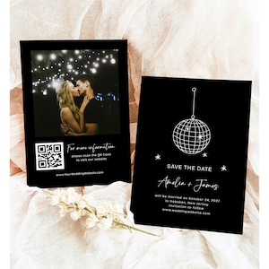 May include: Black and white wedding save-the-date cards. One card features a photo of a couple kissing under string lights, with a QR code and website address. The other card has a disco ball graphic and wedding details.