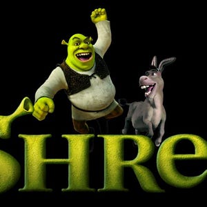 May include: Image of the word "Shrek" in large, green, textured letters. Above the word, the animated character Shrek is jumping with joy, and the Donkey is standing next to him. The background is black.