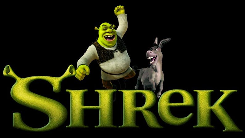 May include: Image of the word "Shrek" in large, green, textured letters. Above the word, the animated character Shrek is jumping with joy, and the Donkey is standing next to him. The background is black.