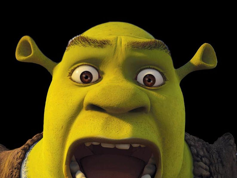 May include: Close-up of Shrek's face, a green ogre with large brown eyes and a wide open mouth. His ears are visible, and he has a surprised expression. The background is solid black.
