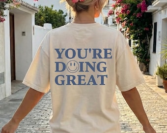 Camiseta "Lo estás haciendo genial", camiseta con cita positiva, sudadera con capucha sobre salud mental, camiseta con carita sonriente, sudadera motivacional, regalo inspirador