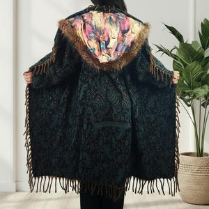 May include: A set of three ceramic mugs with a speckled, matte finish. Each mug features a different color: light blue, cream, and gray. The mugs have a simple, modern design and a comfortable handle.