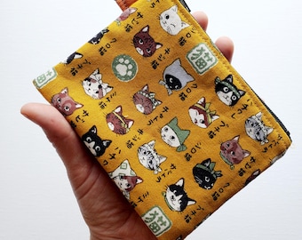 Small wallet with a key ring - 5" wide X 4" long, a zipper pouch with 1 inner pocket, Japanese cats