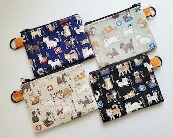 Small wallet with a key ring - 5" wide X 4" long, a zipper pouch with 1 inner pocket, Japanese dogs