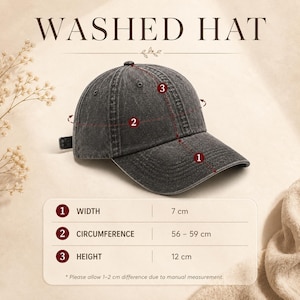 May include: A charcoal gray washed denim baseball cap with a curved brim. The text WASHED HAT appears at the top. A measurement chart indicates a brim width of 7 cm, a head circumference of 56-59 cm, and a total hat height of 12 cm.
