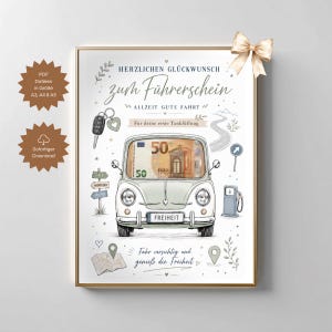 May include: A framed print featuring a vintage car illustration with a 50 Euro bill visible through the windshield. The text reads Herzlichen Glückwunsch zum Führerschein, Allzeit gute Fahrt, Für deine erste Tankfüllung, Freiheit, and Fahr vorsichtig und genieß die Freiheit. Includes a car key, road signs, and a map.