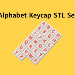 May include: The image displays a set of white keycaps with red lettering, arranged to show the alphabet. The text "Alphabet Keycap STL Set" is at the top. The background is a solid yellow color.