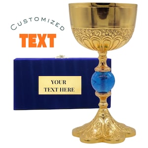 May include: A white ceramic mug with a black handle and the text "But first, coffee" in a handwritten style. The mug is on a white surface. The mug is 4 inches tall.