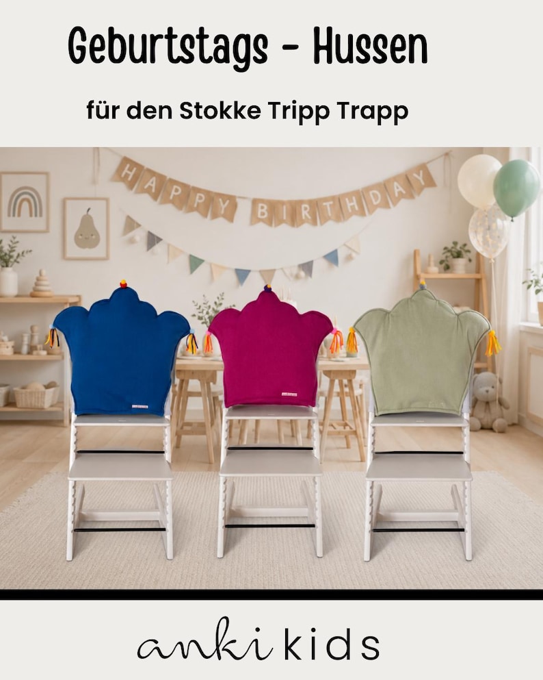 May include: Three crown-shaped high chair cushions in blue, magenta, and sage green, each featuring small colorful tassels on the sides. The cushions are designed for a wooden high chair and are displayed in a room with birthday decorations.