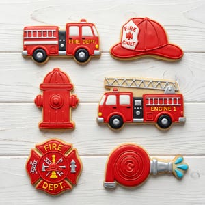 May include: A collection of decorated sugar cookies in the shape of fire department-themed items. The cookies include a fire truck, a fire chief hat, a fire hydrant, a fire engine, a fire department badge, and a fire hose. The cookies are red, white, and black.