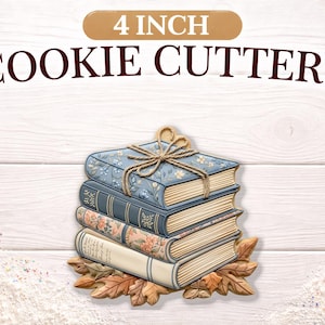May include: A stack of four book-shaped cookie cutters, each with a unique design, tied with twine. The cookie cutters are 4 inches in size and sit on a bed of autumn leaves. The text "4 INCH COOKIE CUTTERS" is displayed above.
