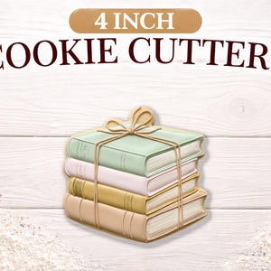 May include: A stack of four book-shaped cookie cutters, each approximately 4 inches in size, tied together with twine. The books are in shades of green, white, and tan. The words "4 INCH COOKIE CUTTERS" are displayed above the cutters.
