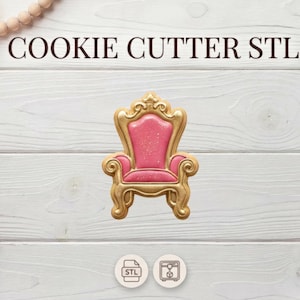 May include: A gold-colored cookie cutter in the shape of a throne with a pink seat. The words "COOKIE CUTTER STL" are at the top. The image is on a white wooden background with decorative elements.
