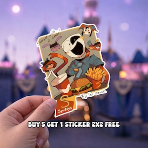 May include: A sticker featuring a cartoon character with a large white face, a blue uniform, and an orange scarf, holding a burger and fries. The sticker includes the text "Serve with a smile!" and "Try the sauce." The sticker is labeled "Spudsy's."