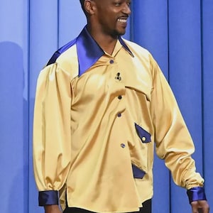 Camisa Gordon Gartrelle: Fantasia de paródia dos anos 80 inspirada no Cosby Show
