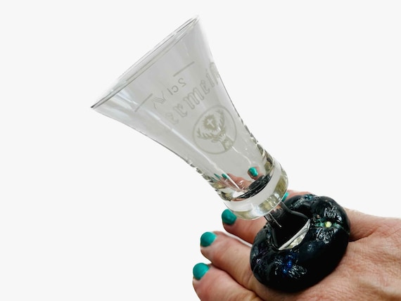 A cocktail ring literally made from an upcycled shot glass bottom — 49 favorites don't lie, this is wearable bar-cart art with a great story.