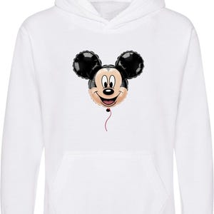 May include: White hooded sweatshirt featuring a Mickey Mouse balloon graphic. The balloon has black ears, a smiling face, and a red string. The sweatshirt has a front pocket and a hood.