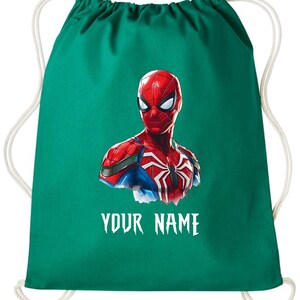May include: A green drawstring backpack featuring a graphic of Spider-Man. The superhero is depicted in his classic red and blue suit. The text "YOUR NAME" is printed in white below the image.