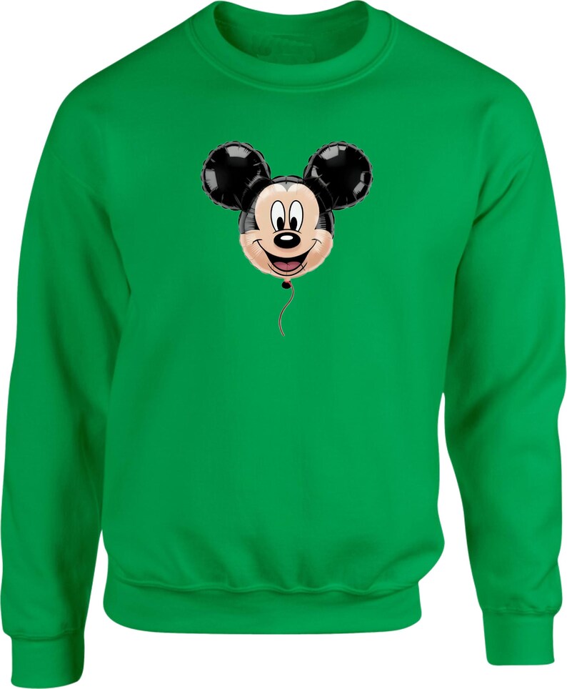 May include: A green sweatshirt featuring a Mickey Mouse balloon design. The balloon has black ears, a beige face, and a red string. The sweatshirt is a solid green color.