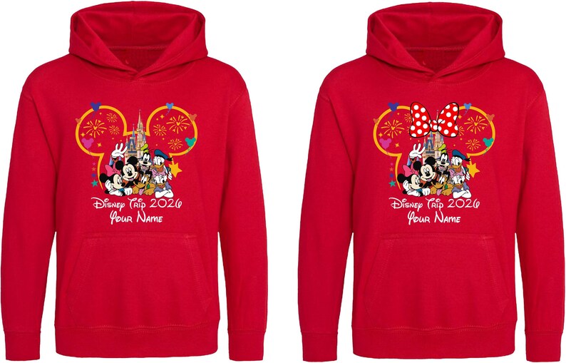 May include: Two bright red hooded sweatshirts featuring a graphic of Disney characters in front of a castle inside a Mickey Mouse ear outline. The text reads Disney Trip 2026 and Your Name. One hoodie includes a red and white polka dot bow graphic.
