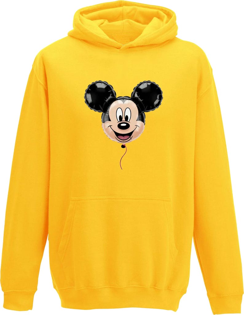 May include: A yellow hooded sweatshirt featuring a Mickey Mouse balloon graphic. The graphic shows Mickey's face with black ears and a smiling expression. The sweatshirt has a front pocket and a drawstring hood.