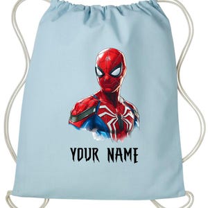 May include: Light blue drawstring backpack featuring a vibrant illustration of Spider-Man. The superhero is depicted in his classic red and blue suit, with a white spider emblem. The text "YOUR NAME" is printed in black.