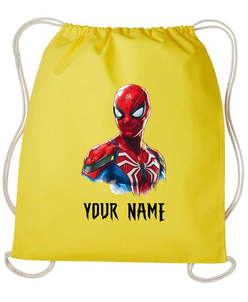 May include: Yellow drawstring backpack featuring a graphic of Spider-Man. The superhero is depicted in red, blue, and white, with the text "YOUR NAME" in black below the image. The bag has white drawstrings.