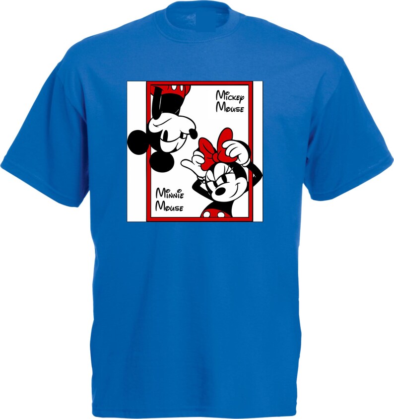 May include: A royal blue t-shirt featuring a graphic of Mickey and Minnie Mouse. The image shows Mickey Mouse upside down and Minnie Mouse right-side up, with the words "Mickey Mouse" and "Minnie Mouse" in a red-bordered box.