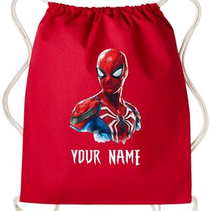 May include: Red drawstring backpack featuring a detailed illustration of Spider-Man. The superhero is depicted in his classic red and blue suit. The text "YOUR NAME" is printed in white below the image.