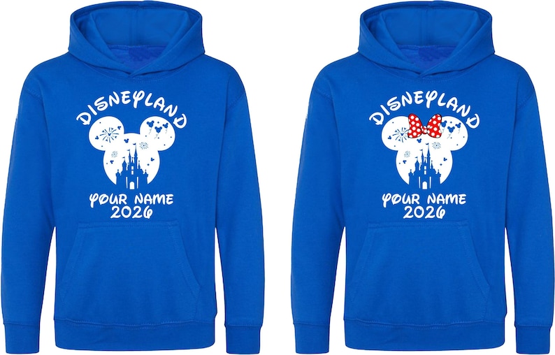 May include: A white ceramic mug with a black handle and the text "But First, Coffee" in a handwritten style. The mug is on a white surface. The mug is likely for hot beverages.