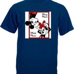 May include: Navy blue t-shirt featuring a graphic of Mickey and Minnie Mouse. The design shows Mickey Mouse upside down and Minnie Mouse right-side up, both in a red-framed box. Text includes "Mickey Mouse" and "Minnie Mouse".