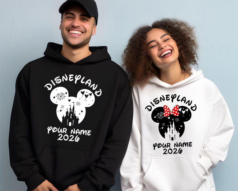 May include: A white ceramic mug with a black handle and the text "But First, Coffee" in a bold, black font. The mug is sitting on a wooden surface. The mug is approximately 4 inches tall.