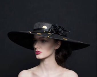 black large brim hat with gold spots. for Mother of the bride/groom, Ascot, Cheltenham, Dubai World Cup, The Curragh.m- Miss Dotty