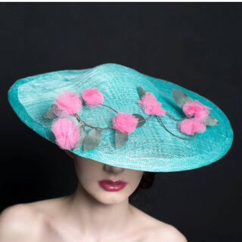 Stunning saucer hat In torquoise and pink. ladies day Miss Spring mother of bridegroom Ascot