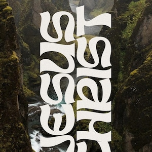 May include: A poster with a scenic canyon landscape and a river. The poster has bold white text that reads "JESUS CHRIST" and "IF ANYONE IS IN" at the top, with "HE IS A NEW CREATURE" at the bottom. The background has natural, earthy tones.