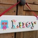 see more listings in the Illustrated name signs section